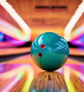 Close-up of a teal bowling ball on a glossy lane with vibrant neon background lights.