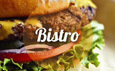 A close-up of a cheeseburger with lettuce, tomato, and onion with a Bistro text overlay.