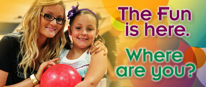 A woman and a young girl holding a red bowling ball next to text reading The Fun is here. Where are you?
