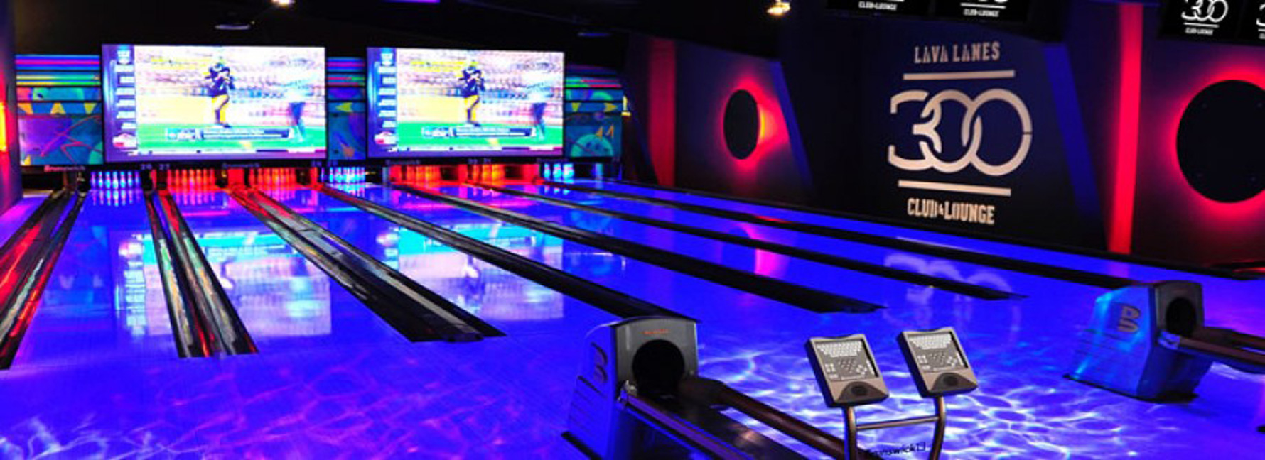 Glowing blue and pink bowling lanes with large video screens and the 300 Club and Lounge logo.