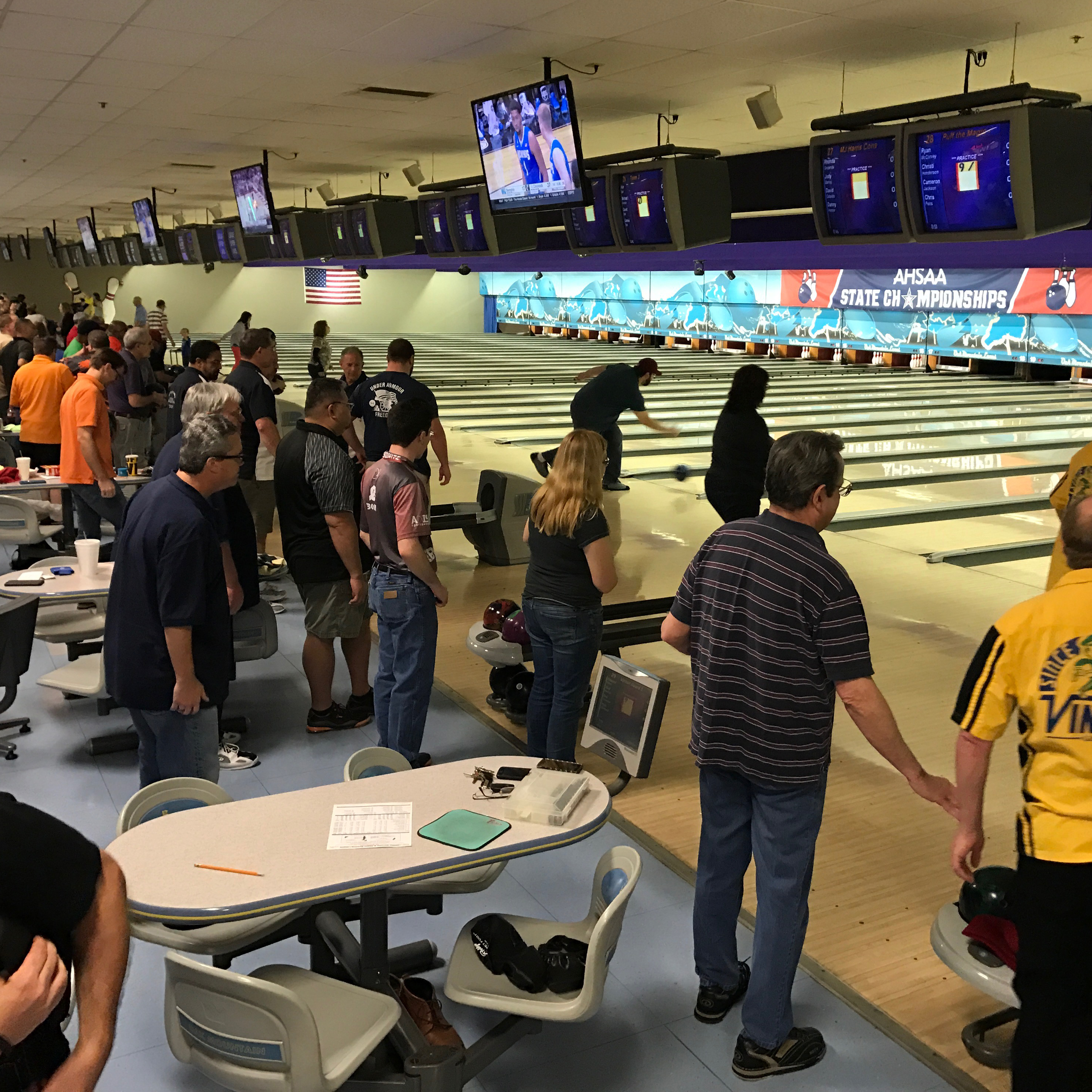 A busy bowling center filled with bowlers and spectators during the AHSAA State Championships.